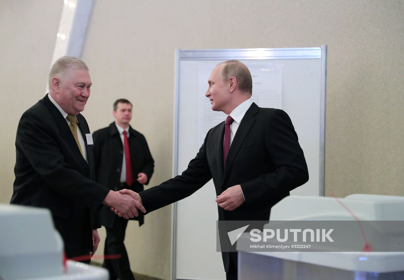 Vladimir Putin votes at Russian presidential elections