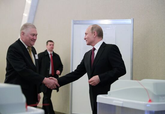 Vladimir Putin votes at Russian presidential elections