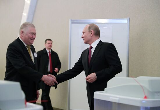 Vladimir Putin votes at Russian presidential elections