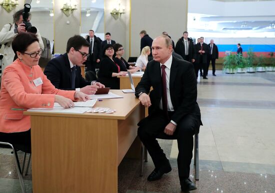 Vladimir Putin votes at Russian presidential elections
