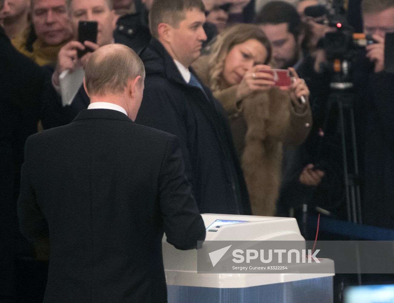 Vladimir Putin votes at Russian presidential elections