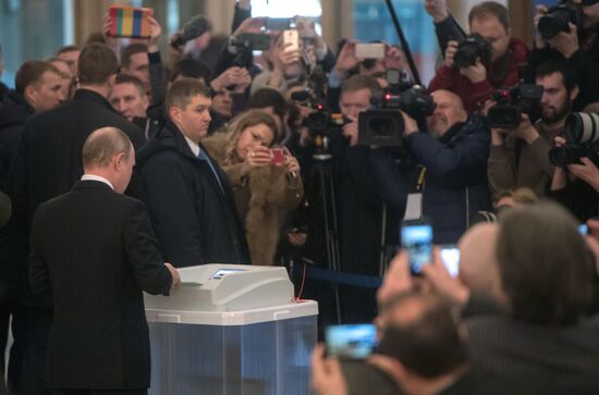 Vladimir Putin votes at Russian presidential elections