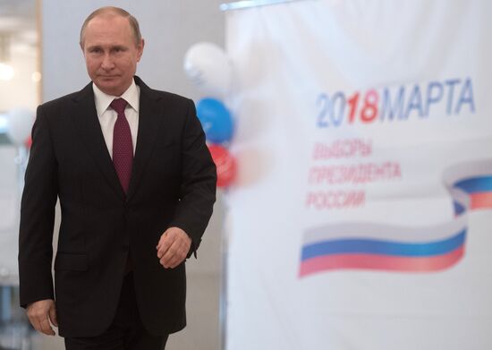 Vladimir Putin votes at Russian presidential elections