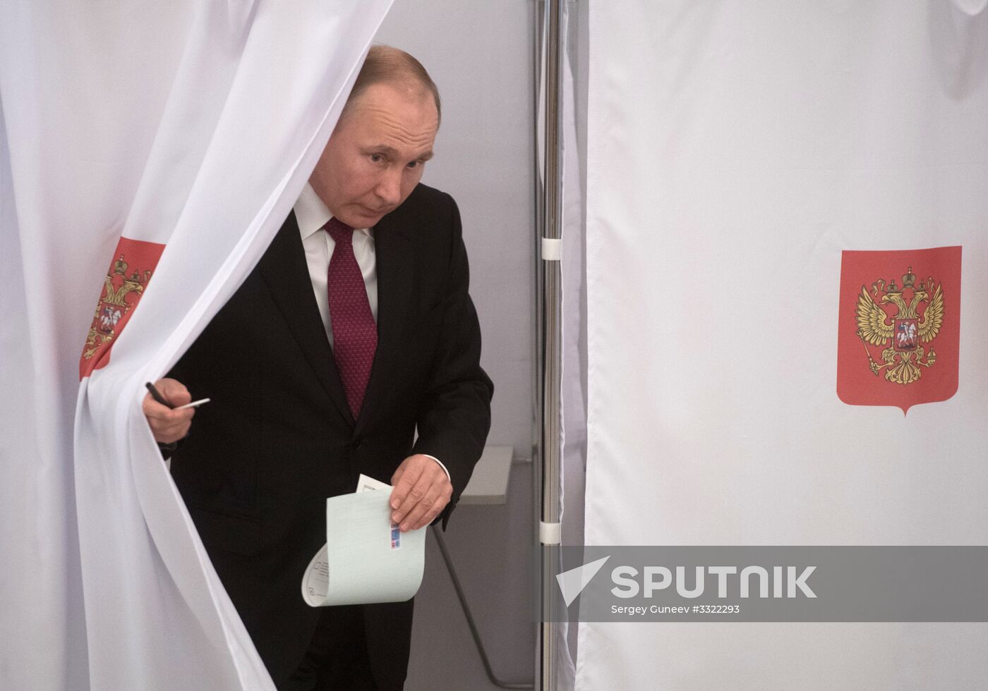 Vladimir Putin votes at Russian presidential elections