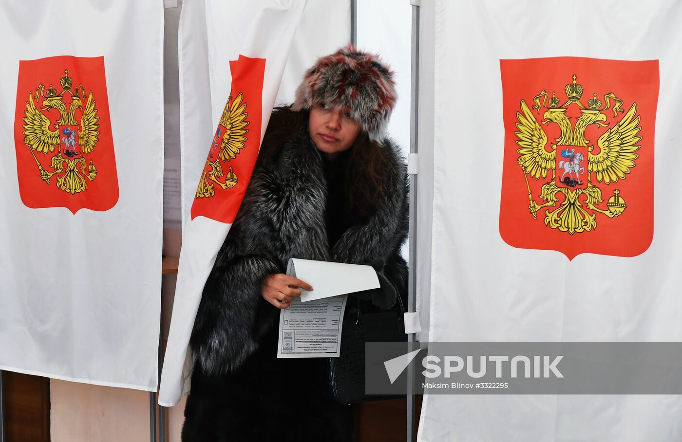 Russian presidential candidates cast their votes