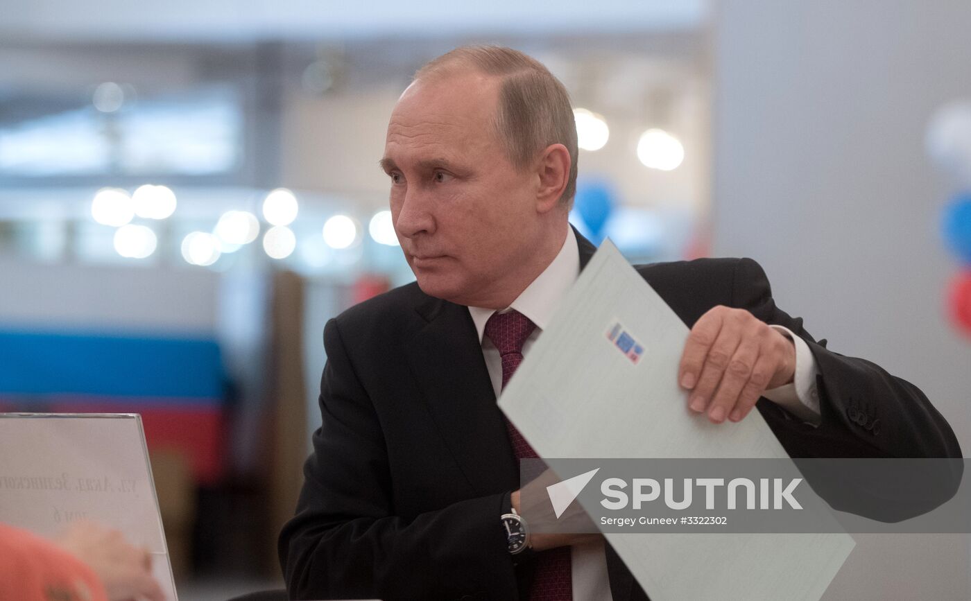 Vladimir Putin votes at Russian presidential elections