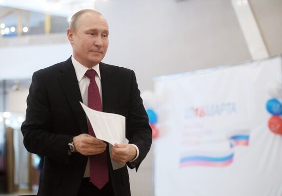 Vladimir Putin votes at Russian presidential elections