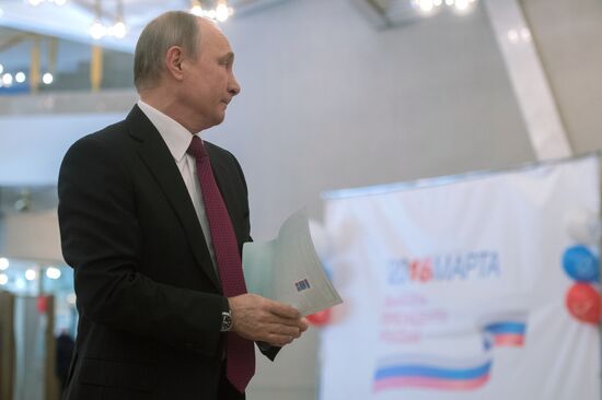 Vladimir Putin votes at Russian presidential elections