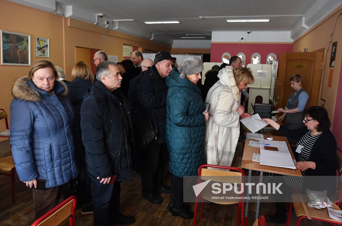 Russian presidential candidates cast their votes