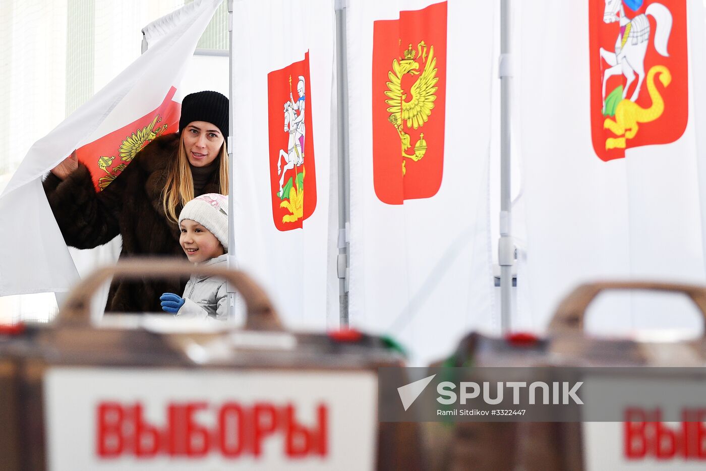Russian presidential candidates cast their votes
