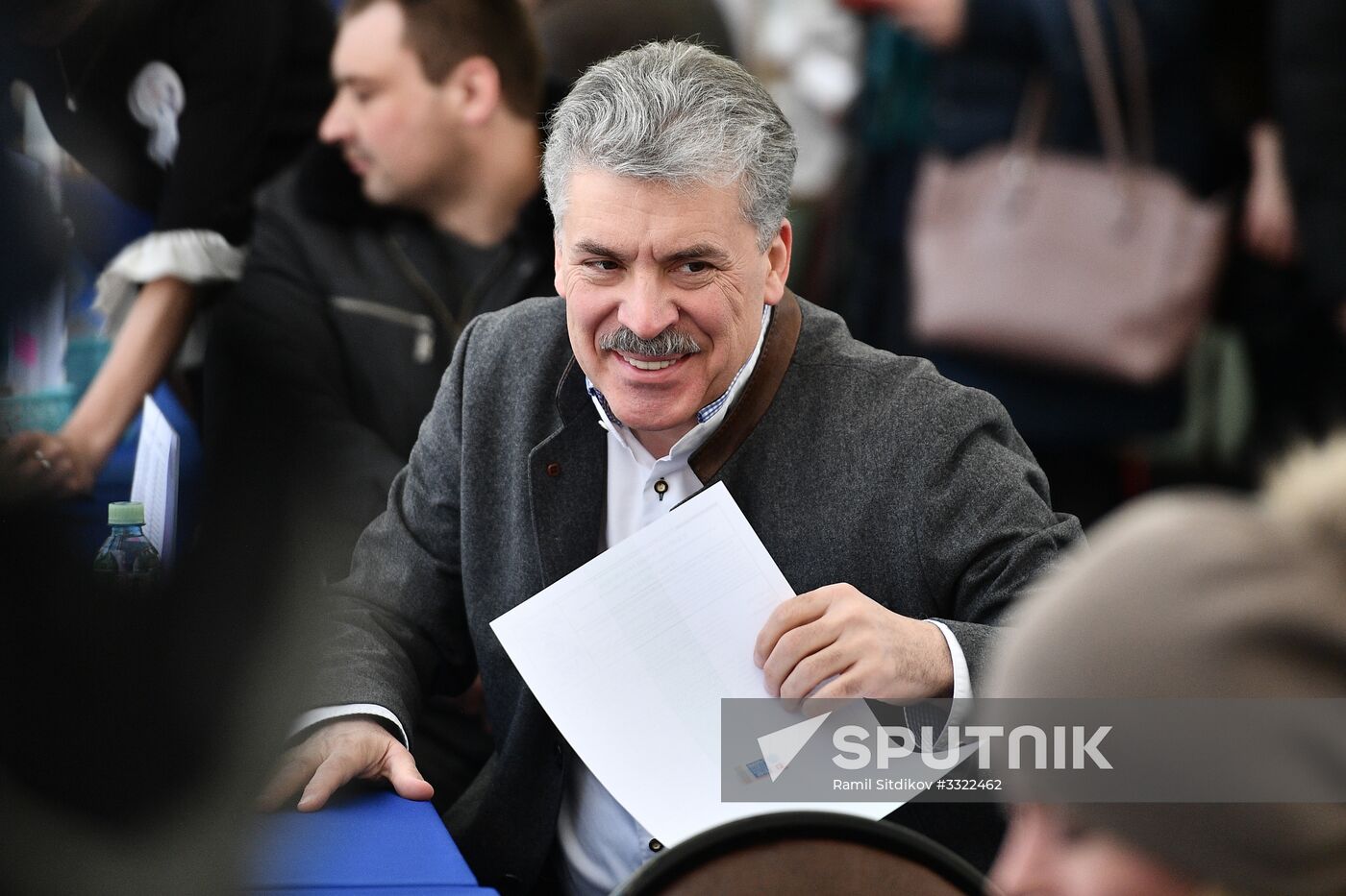 Russian presidential candidates cast their votes