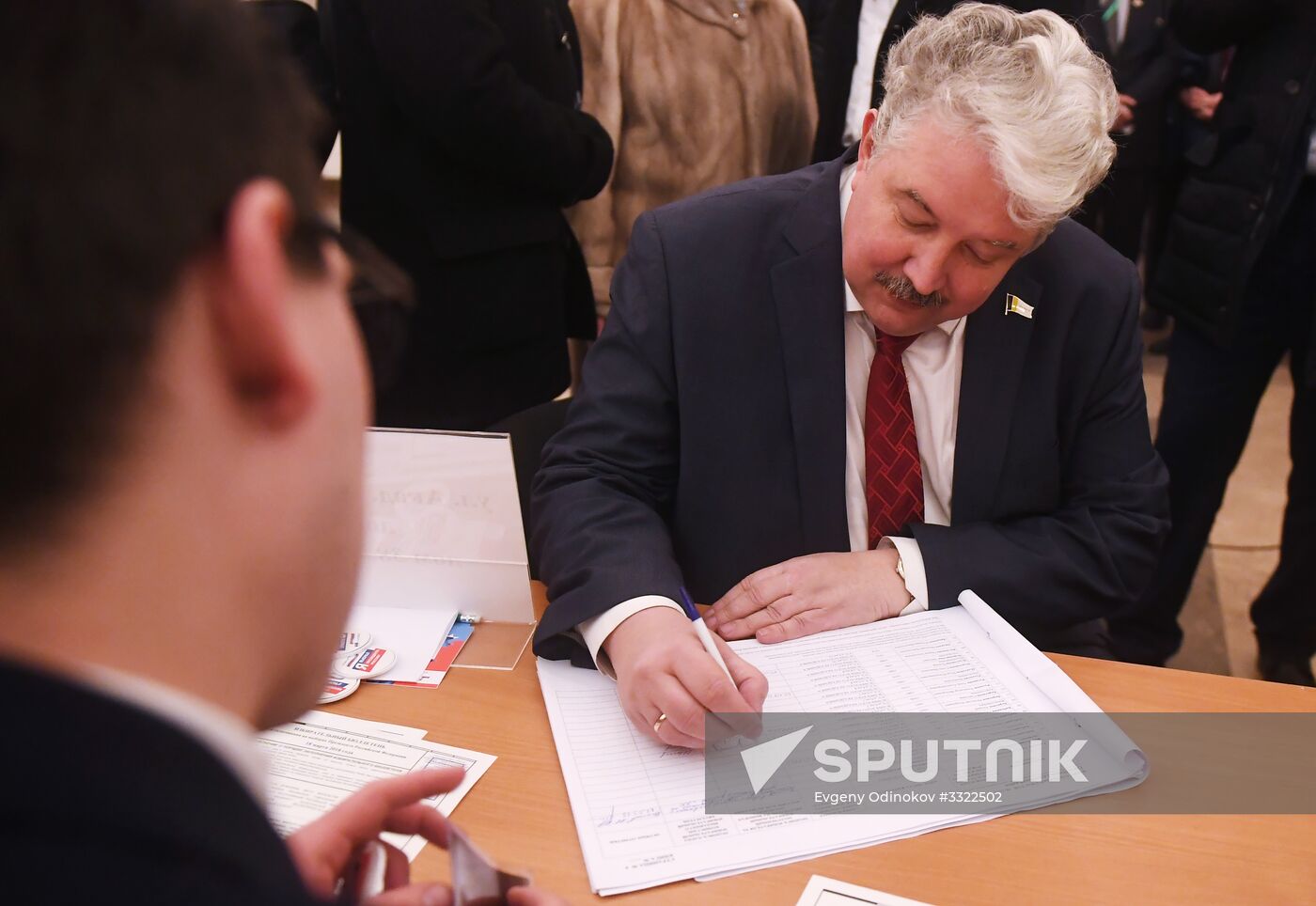 Russian presidential candidates cast their votes