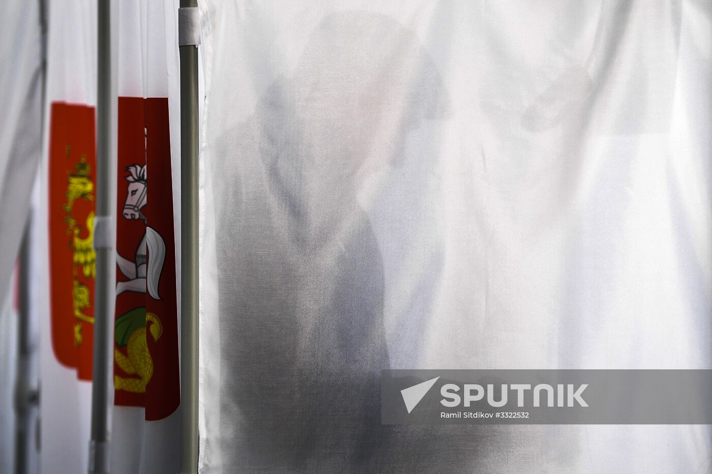 Russian presidential candidates cast their votes
