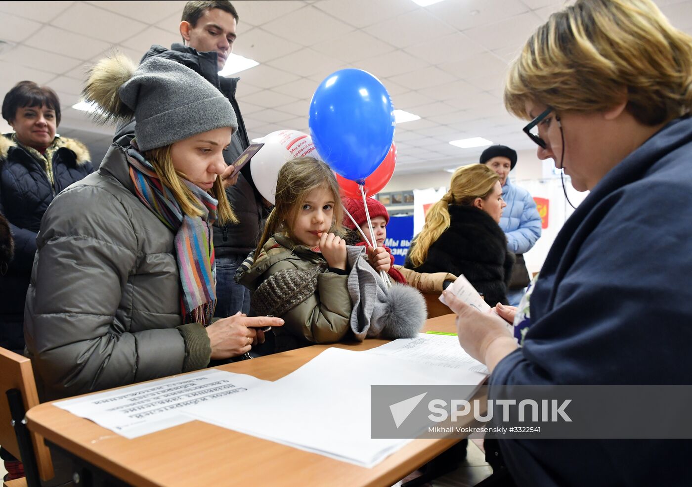 Russian presidential candidates cast their votes