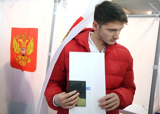 Members of Russian national football team vote at Russian presidential election
