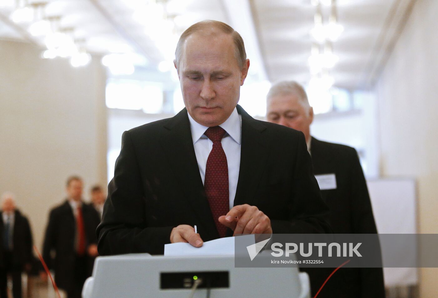 Vladimir Putin votes at Russian presidential elections