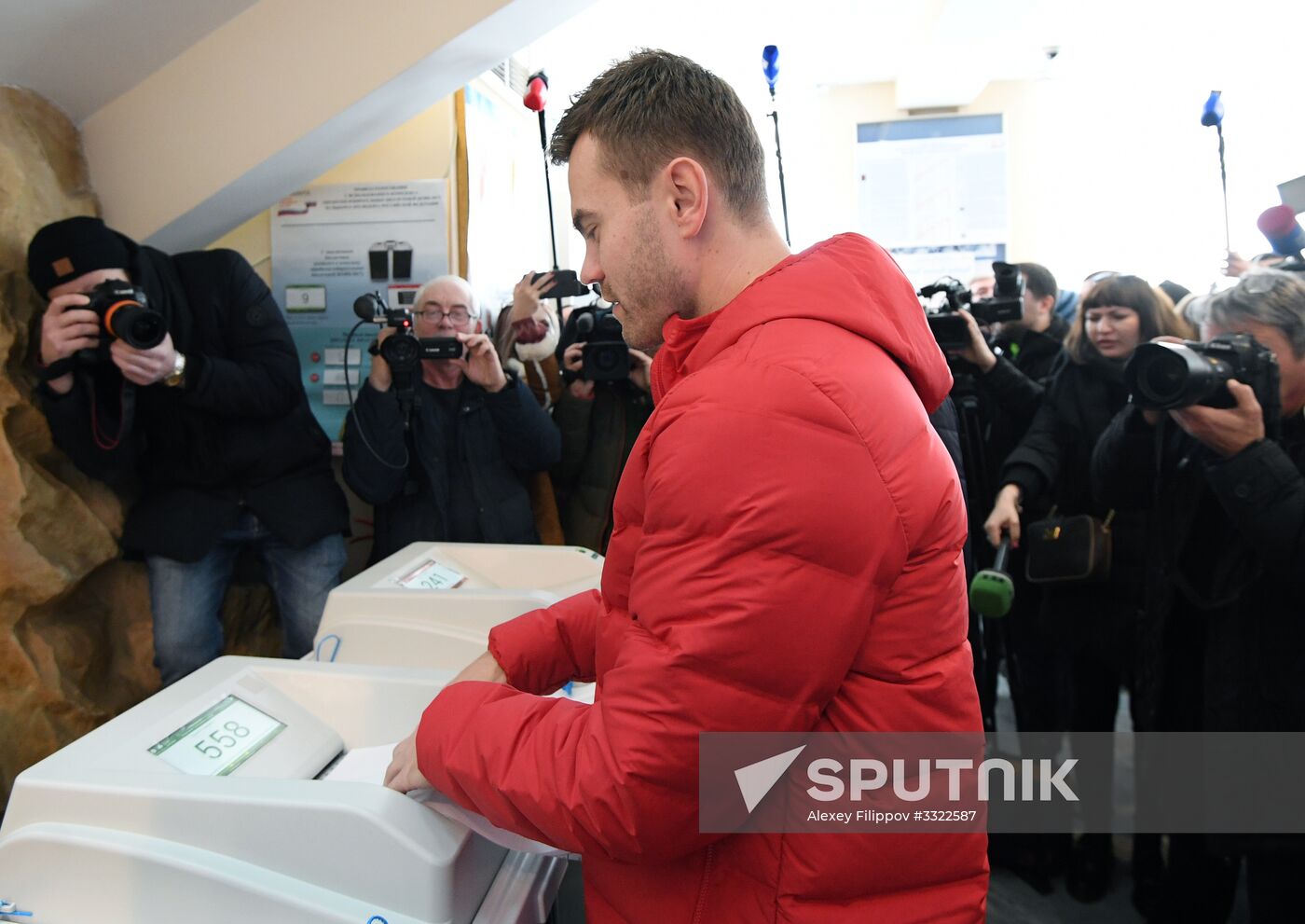 Members of Russian national football team vote at Russian presidential election