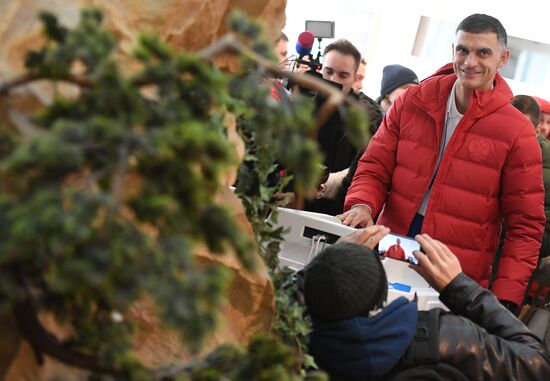 Members of Russian national football team vote at Russian presidential election