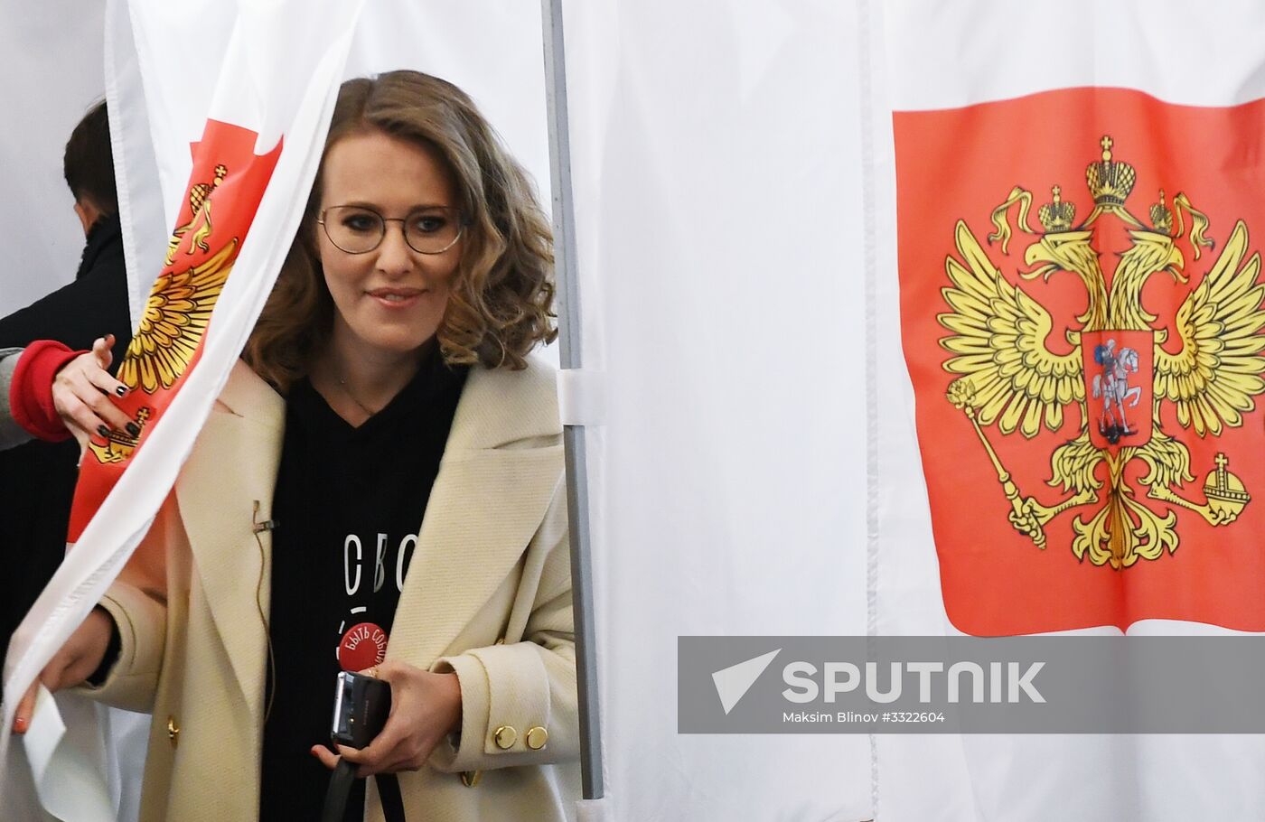 Russian presidential candidates cast their votes