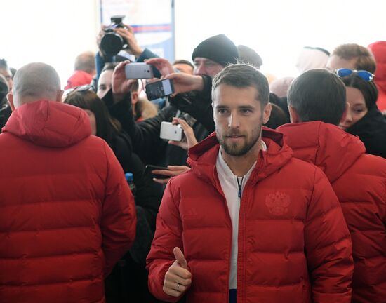 Members of Russian national football team vote at Russian presidential election