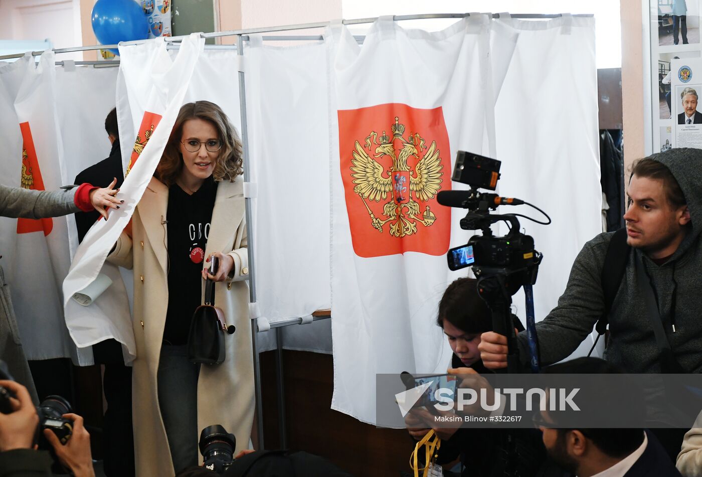 Russian presidential candidates cast their votes