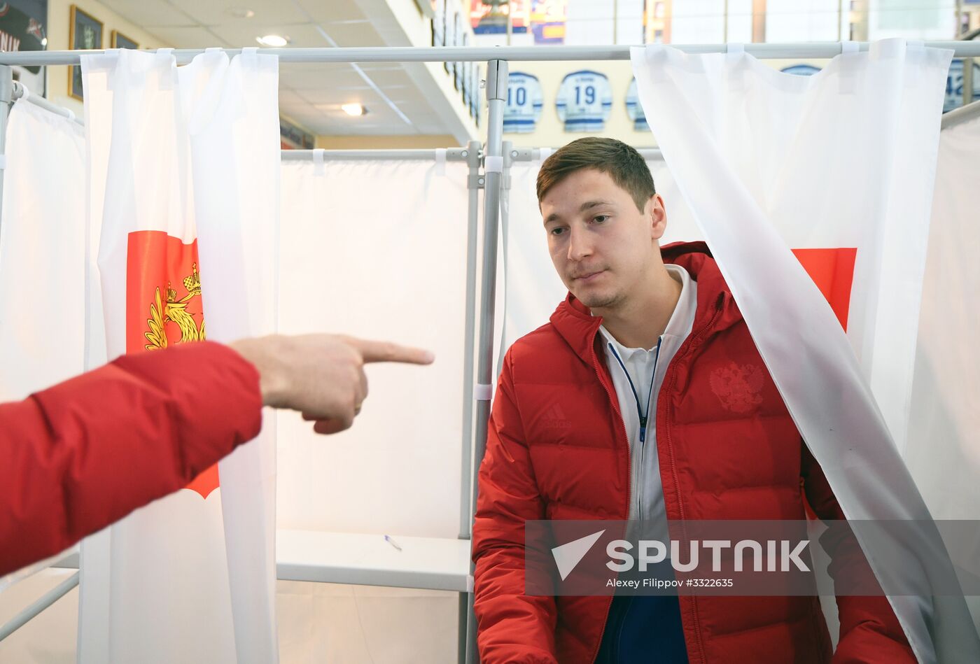 Members of Russian national football team vote at Russian presidential election