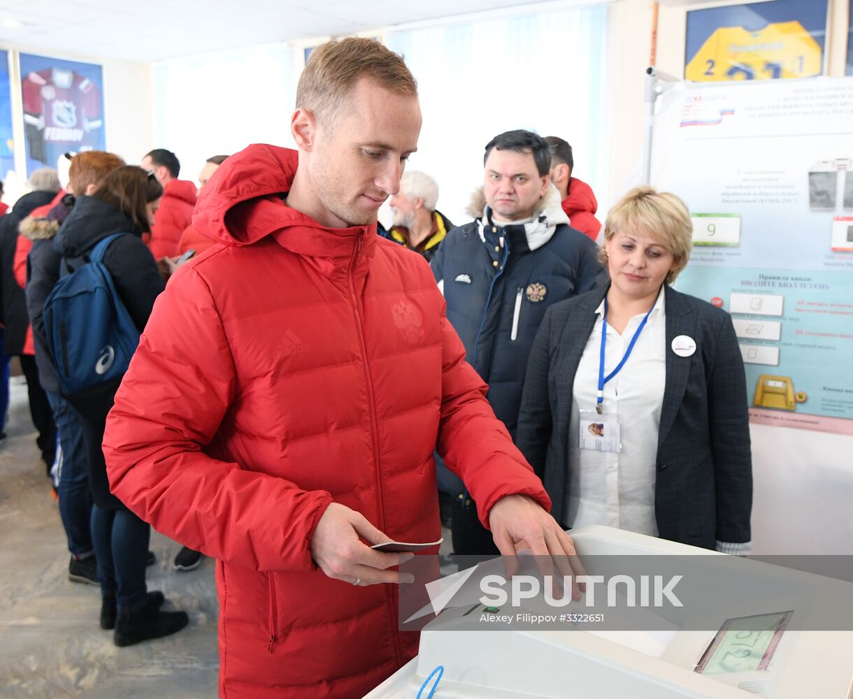 Members of Russian national football team vote at Russian presidential election