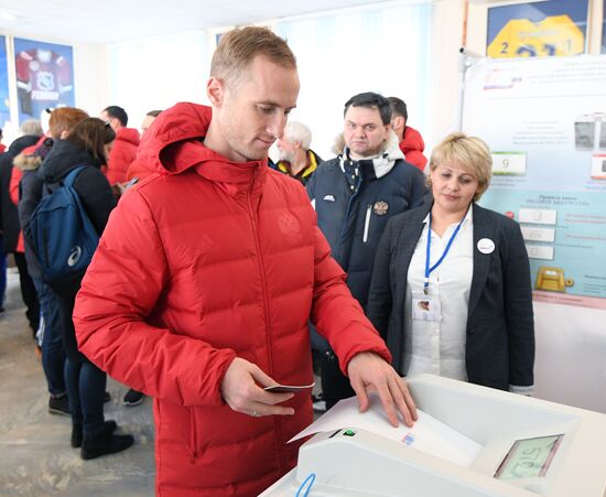 Members of Russian national football team vote at Russian presidential election