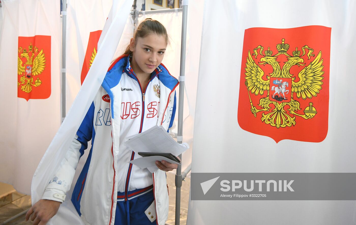 Members of Russian national football team vote at Russian presidential election