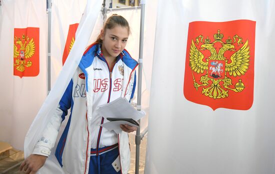 Members of Russian national football team vote at Russian presidential election