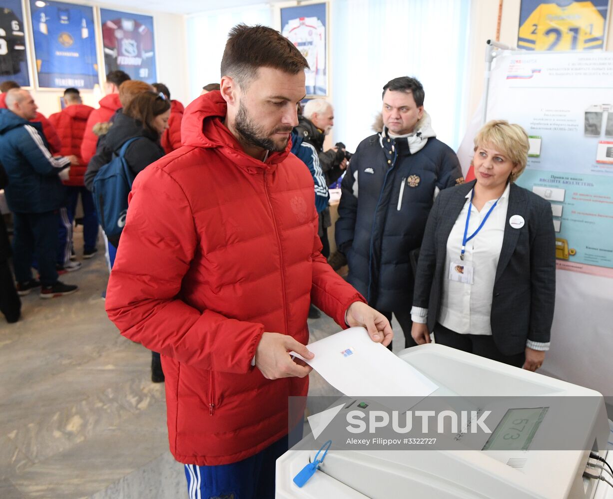 Members of Russian national football team vote at Russian presidential election
