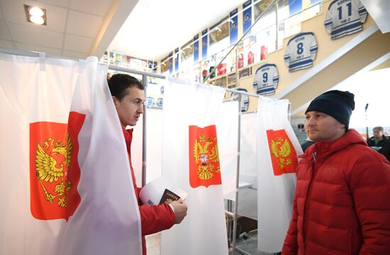 Members of Russian national football team vote at Russian presidential election