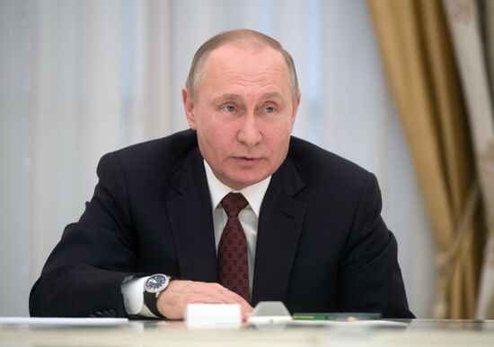 President Vladimir Putin meets with presidential nominees