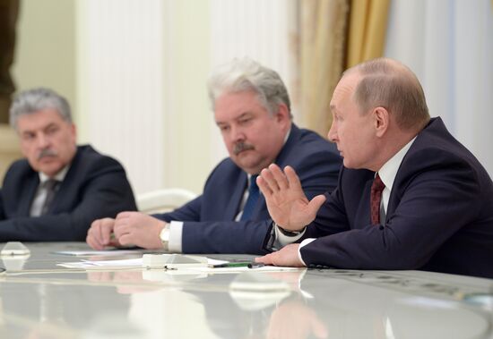 President Vladimir Putin meets with presidential nominees