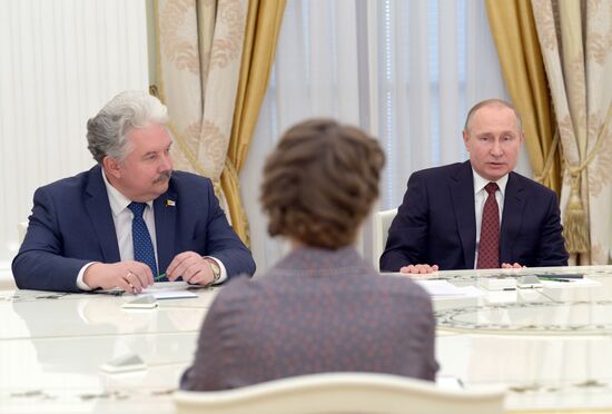 President Vladimir Putin meets with presidential nominees