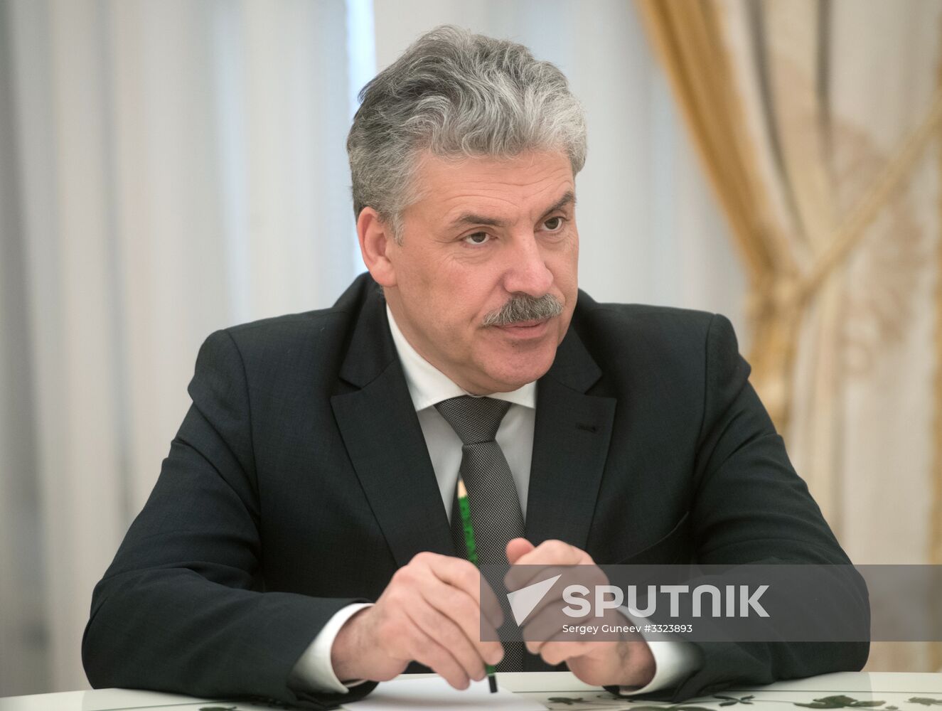 President Vladimir Putin meets with presidential nominees