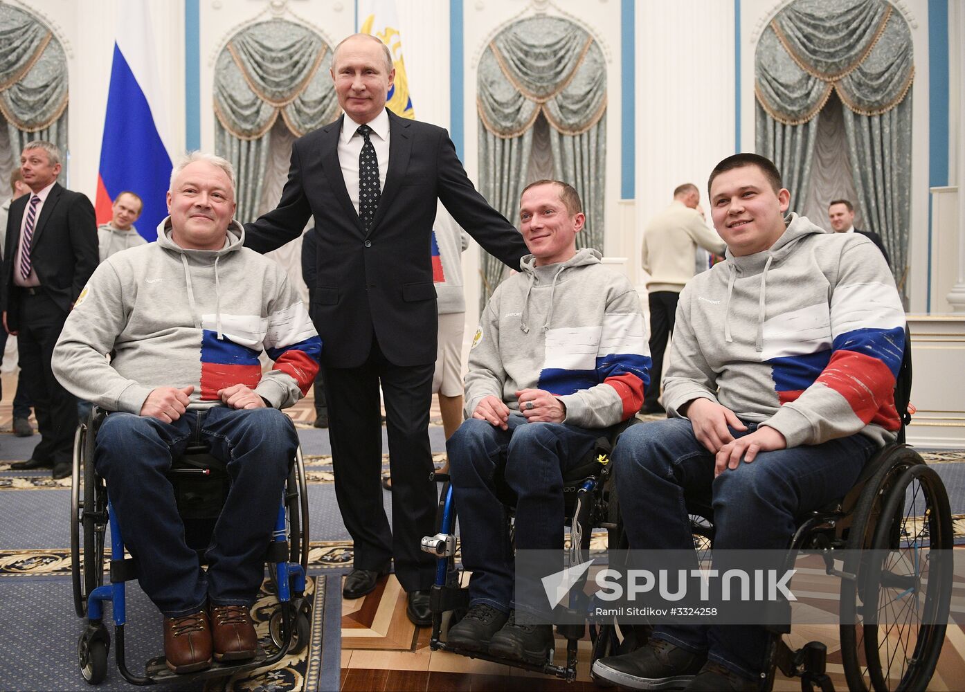 Russian President Vladimir Putin meets with Russian athletes - winners and medalists of 12th Paralympic Winter Games