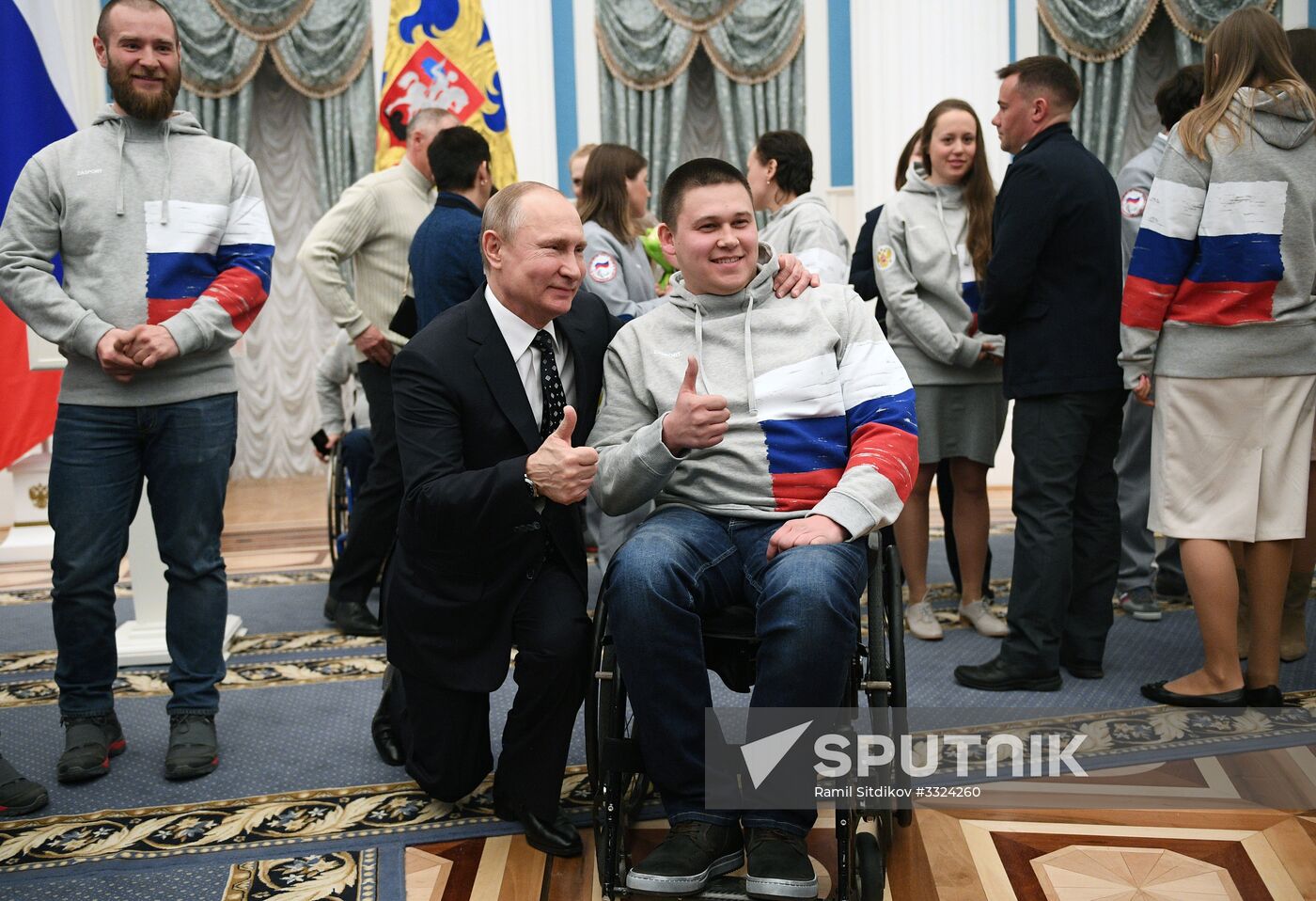Russian President Vladimir Putin meets with Russian athletes - winners and medalists of 12th Paralympic Winter Games