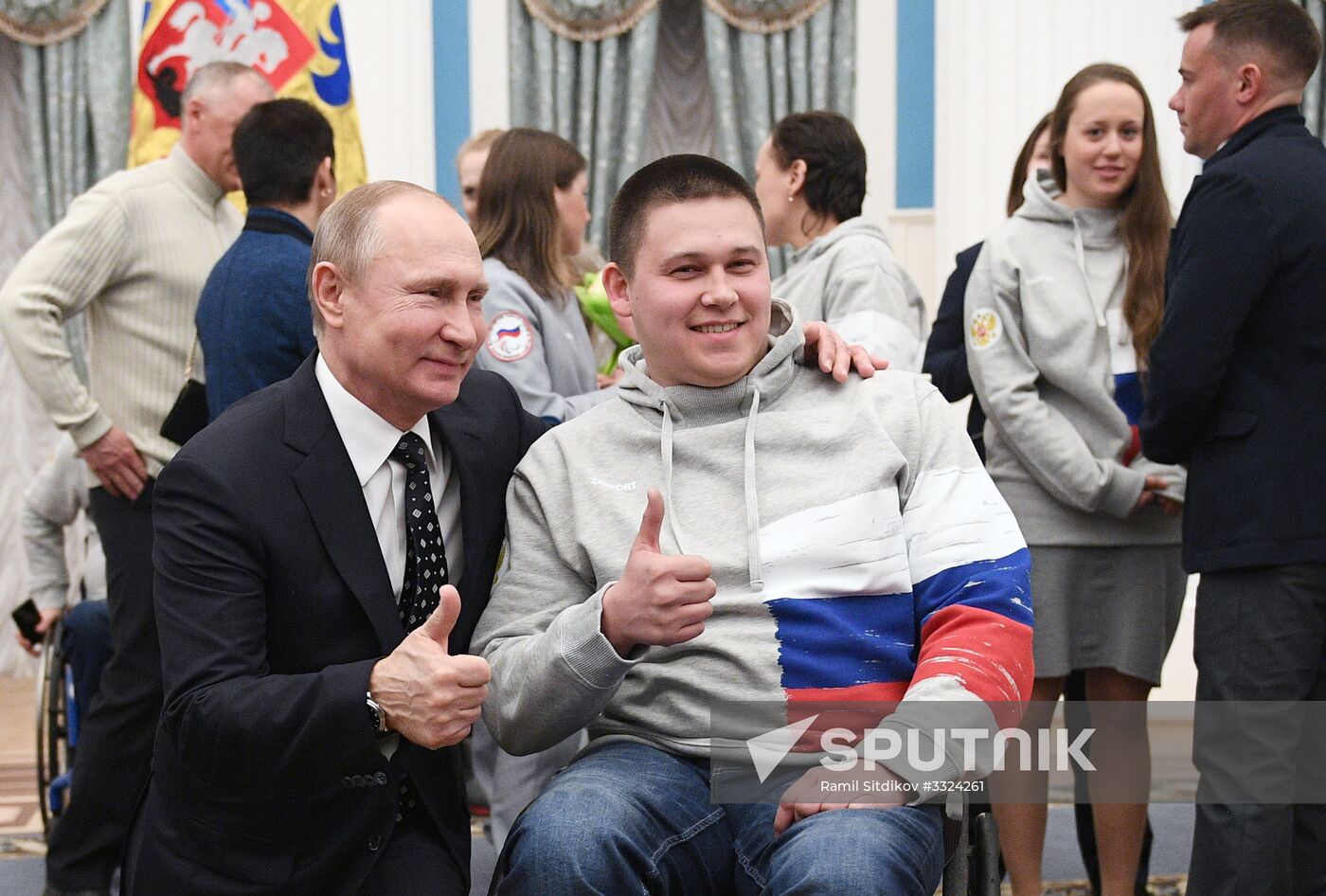 Russian President Vladimir Putin meets with Russian athletes - winners and medalists of 12th Paralympic Winter Games