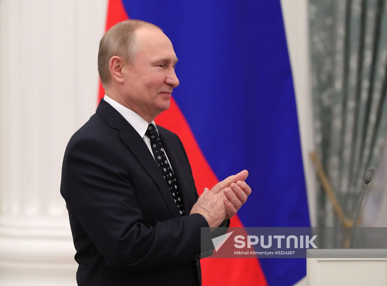 Russian President Vladimir Putin meets with Russian athletes - winners and medalists of 12th Paralympic Winter Games