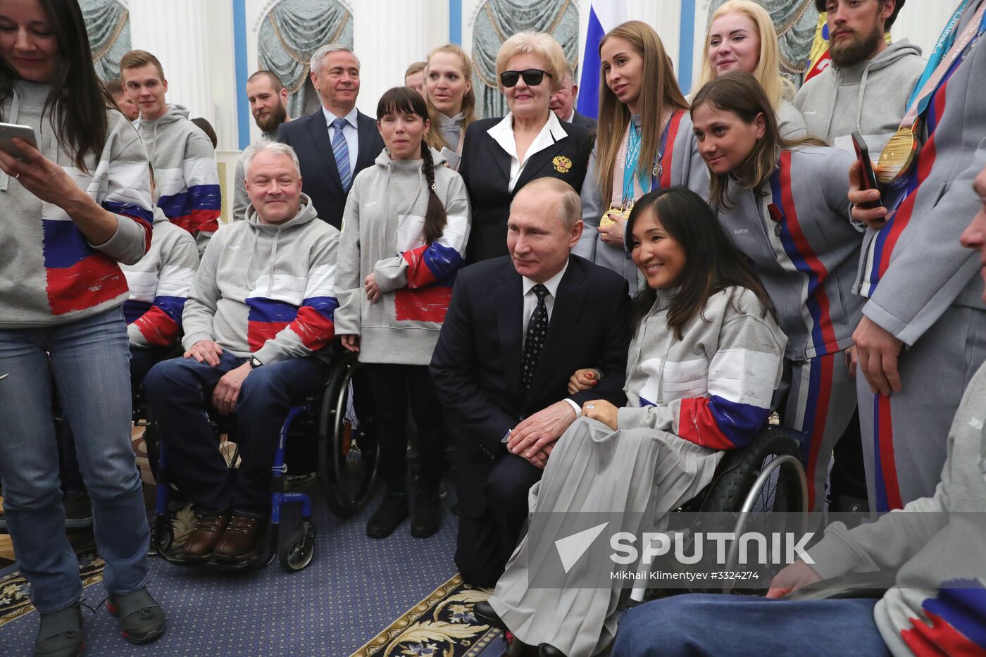 Russian President Vladimir Putin meets with Russian athletes - winners and medalists of 12th Paralympic Winter Games