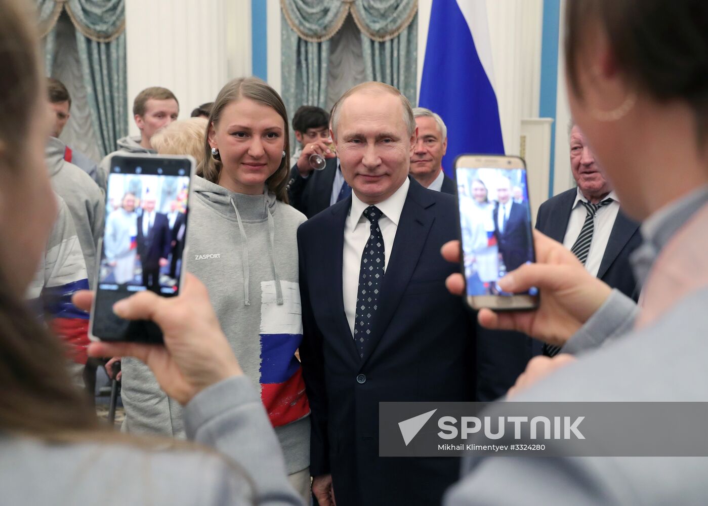 Russian President Vladimir Putin meets with Russian athletes - winners and medalists of 12th Paralympic Winter Games