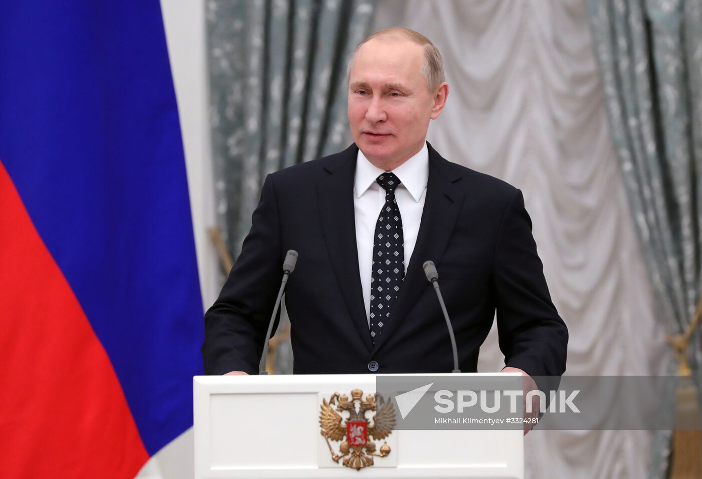 Russian President Vladimir Putin meets with Russian athletes - winners and medalists of 12th Paralympic Winter Games