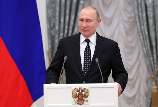 Russian President Vladimir Putin meets with Russian athletes - winners and medalists of 12th Paralympic Winter Games