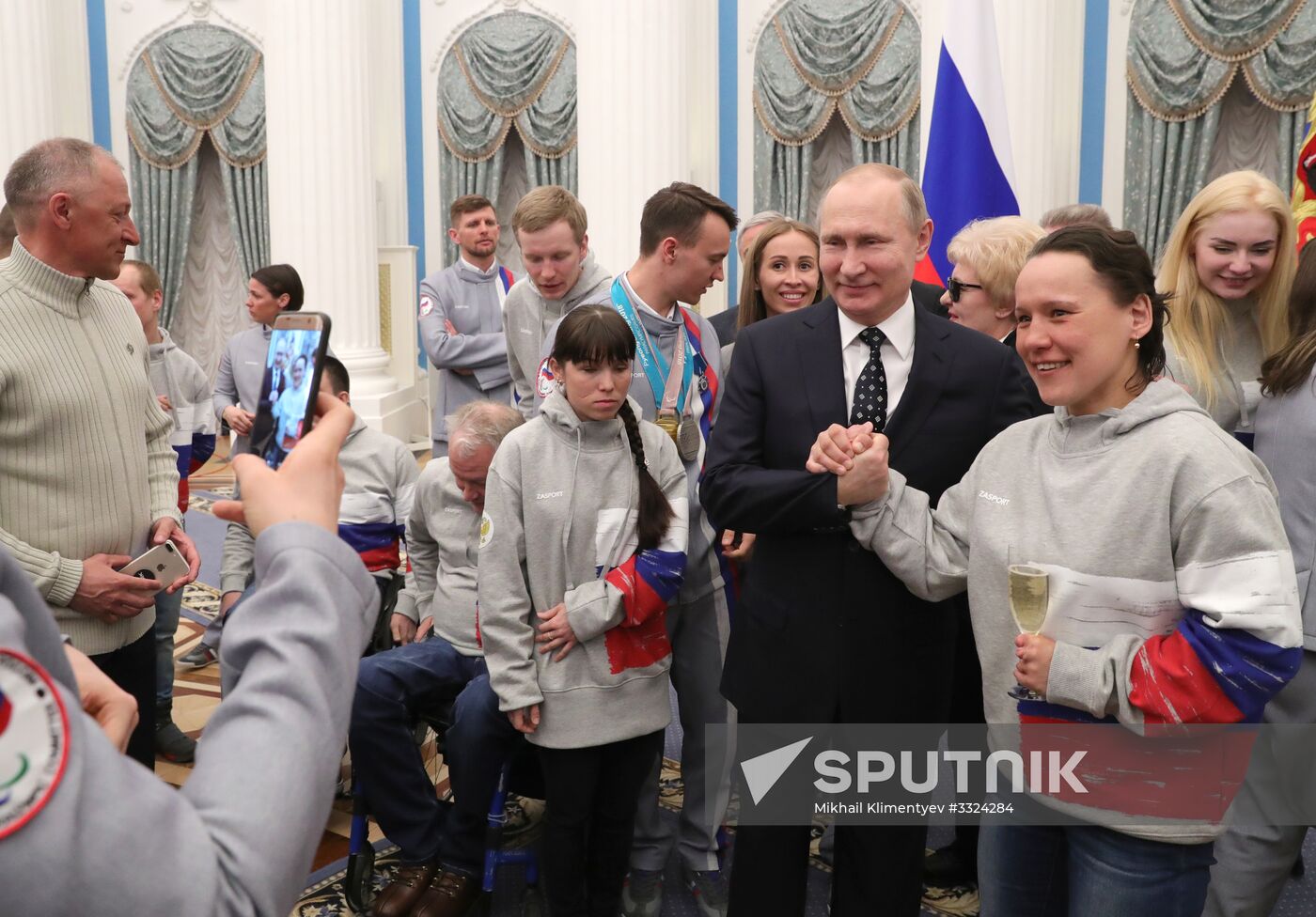 Russian President Vladimir Putin meets with Russian athletes - winners and medalists of 12th Paralympic Winter Games