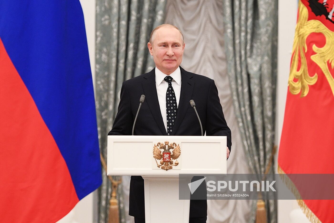 Russian President Vladimir Putin meets with Russian athletes - winners and medalists of 12th Paralympic Winter Games