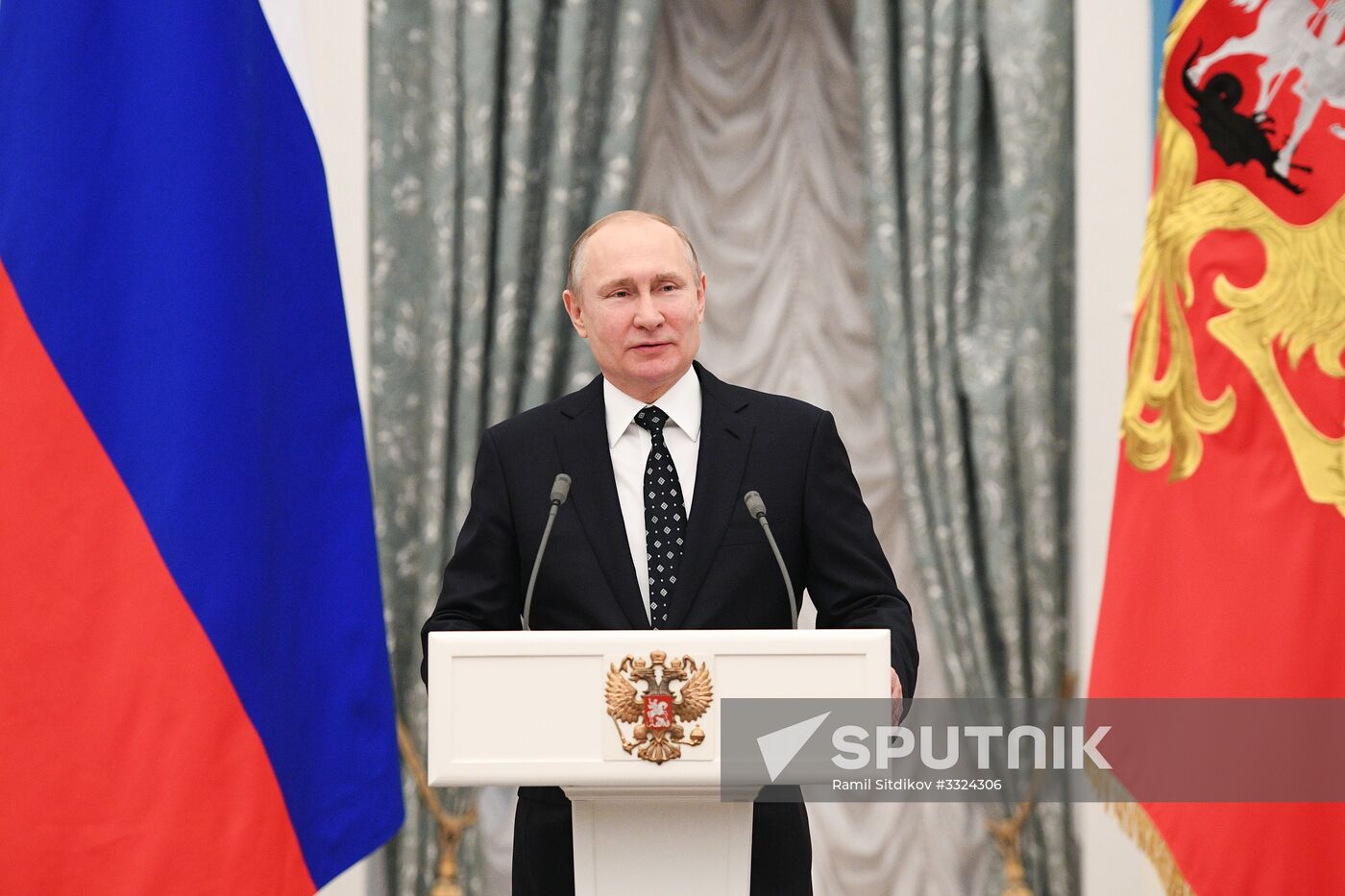 Russian President Vladimir Putin meets with Russian athletes - winners and medalists of 12th Paralympic Winter Games