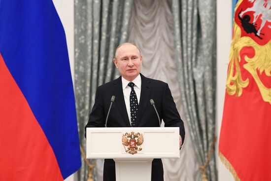 Russian President Vladimir Putin meets with Russian athletes - winners and medalists of 12th Paralympic Winter Games