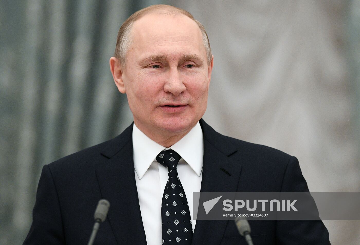 Russian President Vladimir Putin meets with Russian athletes - winners and medalists of 12th Paralympic Winter Games