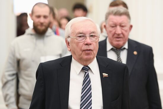 Russian President Vladimir Putin meets with Russian athletes - winners and medalists of 12th Paralympic Winter Games